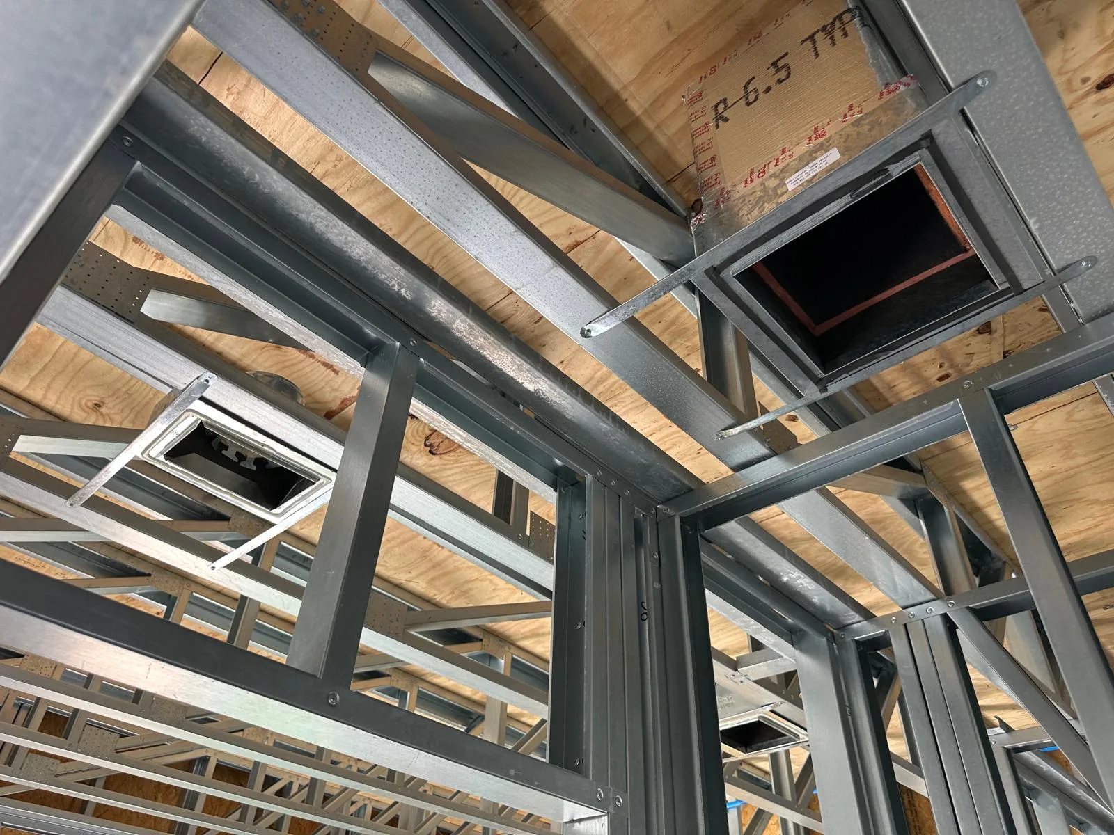 Residential new construction framing with HVAC rough-in openings